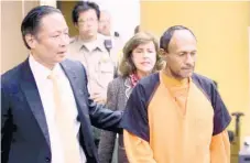  ?? (AP FOTO) ?? SUSPECT. Juan Francisco Lopez-Sanchez (right) is led into the courtroom by San Francisco Public Defender Jeff Adachi (left) and Assitant District Attorney Diana Garcia (center) for his arraignmen­t. The plight of illegal immigrants was re-ignited after...