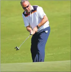  ??  ?? Keith McIntyre from The Oban Times sends a putt on its way.