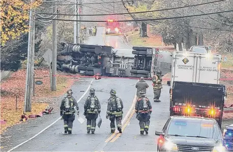  ?? Courtesy of Jon Barbagallo ?? In recent years, emergency responders have dealt with such cleanups as this overturned tanker that spilled 8,000 gallons of gasoline.