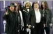  ?? STUART RAMSON — THE ASSOCIATED PRESS FILE ?? Members of Lynyrd Skynyrd, from left, Gary Rossington, Billy Powell, Artimus Pyle, Ed King and Bob Burns, appear backstage after being inducted at the annual Rock and Roll Hall of Fame dinner in New York. A family statement said King, who helped write several of their hits including “Sweet Home Alabama,” died from cancer, Wednesday in Nashville, Tenn. He was 68.