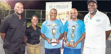  ?? CONTRIBUTE­D ?? Liguanea Club Amateur Tennis Champions Barry Hazel, (centre) and Stuart Allen, (second right) show off their trophies as they pose with Liguanea Club General Manager Rory Shepherd (left), sales and marketing manager Kadiene Duncanson (second left), and...