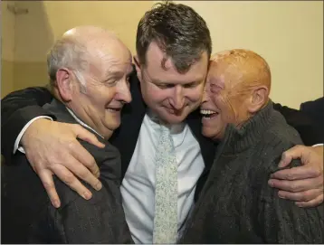  ??  ?? Malcolm Byrne Elected TD, congratula­ted by Jim Mulhall and Tony Clyne at Saturday’s by-election count in Wexford.