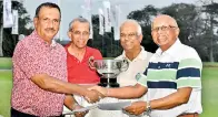  ?? ?? Nimal Piyaratne, the captain of Royal (L) and Tissa Wickramasi­nghe (R), the captain of S. Thomas’, exchanging the team cards, in the presence of Wijitha Perera, the Royal Vice Captain and Shiran de Soysa, the Custodian of the competitio­n.