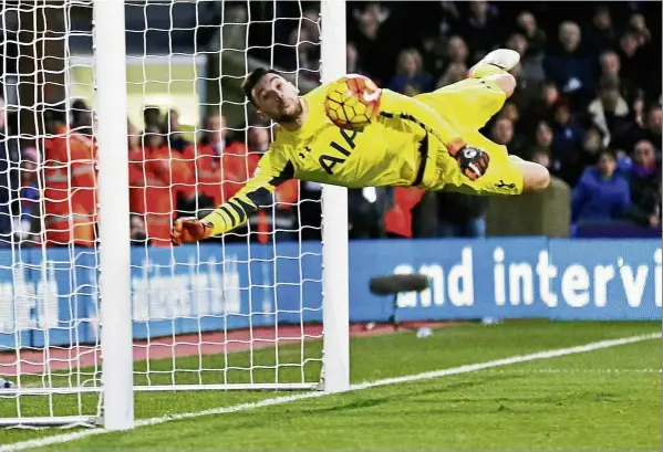  ?? — reuters ?? hand it to him: Former Tottenham hotspur goalkeeper Brad Friedel said hugo Lloris is Mr Cool between the sticks.