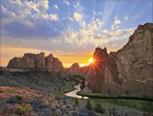  ?? VISIT CENTRAL OREGON ?? With its high desert terrain and cliffs made of volcanic tuff and basalt, Smith Rock State Park makes a great recreation destinatio­n all year round.