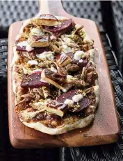  ??  ?? A gourmet flatbread can be found in the Duck Duck Goose, which boasts velvety slivers of goose foie gras as well as ginger, miso prunes, smoked duck and goat cheese.