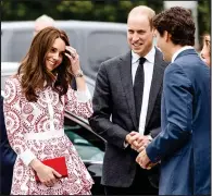  ??  ?? Coy Kate: Mr Trudeau greets the Duchess