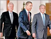  ?? PABLO MARTINEZ MONSIVAIS/AP 2010 ?? Bill Clinton, from left, Barack Obama and George W. Bush say they’ll get a COVID-19 vaccine when available to them.