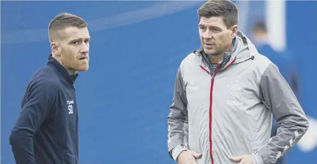  ?? ?? Steven Davis, left, was ‘disappoint­ed’ by the departure of Steven Gerrard but says the next Rangers manager will inherit a ‘really strong squad’