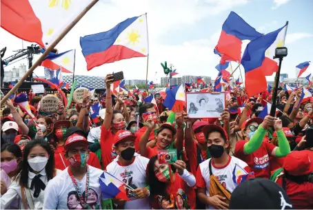  ?? AFP ?? Supporters of Philippine presidenti­al candidate Ferdinand Marcos Jr., son of the late dictator Ferdinand Marcos, take part in a rally in Paranaque City, suburban Manila.