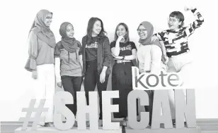  ??  ?? Frenissa (third from left) and her assistant Niko Ng (third rightt) with Atiqah (left), Aina (second left), Nur Adzratull (second right) and Nawwar at the announceme­nt of the first four recipients of the Kotex #SheCan Fund.