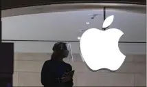  ?? MARK LENNIHAN/AP ?? Apple shares dropped more than 2% in Friday afternoon trading in reaction to a federal court ordering the company to dismantle part of its barricade guarding its app store profits.