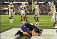  ?? LM OTERO — THE ASSOCIATED PRESS ?? TCU quarterbac­k Max Duggan (15) kneels in the end zone after rushing for a touchdown in the second half of the Big 12Conferen­ce championsh­ip game against Kansas State on Saturday in Arlington, Texas.