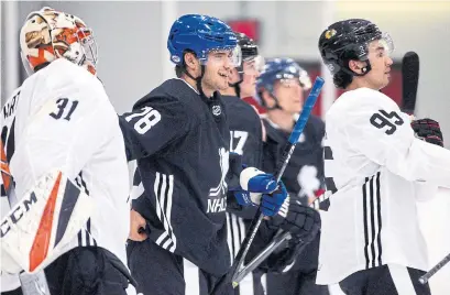  ?? ANDREW FRANCIS WALLACE TORONTO STAR ?? Leafs prospect Timothy Liljegren, in blue helmet, takes part in a showcase event at the Mastercard Centre on Sunday.