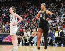  ?? Ethan Miller/Getty Images ?? WNBA All-Star captains Breanna Stewart, left, and A’ja Wilson selected their teams on Saturday through an WNBA All-Star draft.