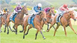  ?? Photo / Peter Rubery ?? Glory Days winning the Listed Wanganui Cup (2040m).