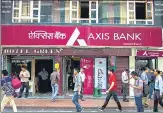  ?? BLOOMBERG ?? The long-term and short-term issuer credit rating on Axis Bank has been raised to ‘BBB-/A-3’ from ‘BB+/B’.