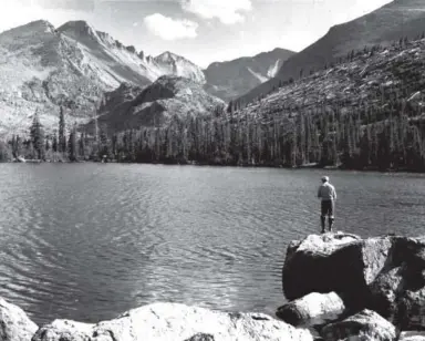  ?? Denver Post file ?? A man fishes at Bear Lake in Rocky Mountain National Park in this photo from May 1941.