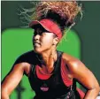  ??  ?? Naomi Osaka of Japan serves to Serena Williams during the Miami Open at Crandon Park Tennis Center in Key Biscayne, Florida.