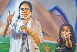  ?? — PTI ?? Trinamul Congress supremo and West Bengal Chief Minister Mamata Banerjee with her nephew Abhisekh Banerjee’s daughter Azania (right), during interactio­n with media in Kolkata on Sunday.