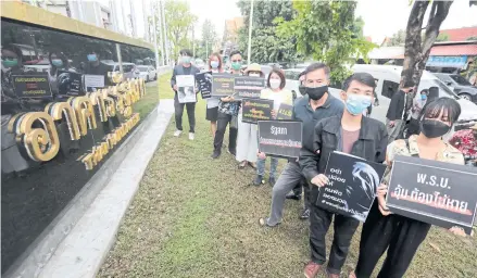  ?? CHANAT KATANYU ?? Rights activists campaign in front of parliament to pressure the House of Representa­tives to read drafts of bills on torture and forced disappeara­nces. The drafts sailed through the House last month.