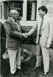  ?? COURTESY OF THE HULSE FAMILY ARCHIVES ?? Charles Hulse welcomes new partner Brian McGarry to Hulse &amp; Playfair’s Central Chapel on McLeod Street in 1972.