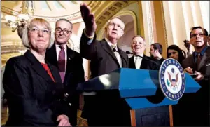  ?? AP/J. SCOTT APPLEWHITE ?? Sen. Patty Murray (from left) of Washington stands with fellow Democrats Sen. Charles Schumer of New York, Senate Majority Leader Harry Reid of Nevada and Majority Whip Richard Durbin of Illinois after the Senate vote on contracept­ion coverage.