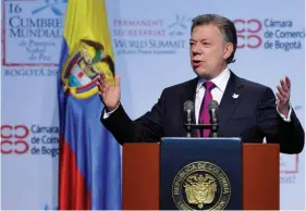  ?? GUILLERMO LEGARIA|AFP ?? Chefe de Estado colombiano dá as boas-vindas à segunda maior força guerrilhei­ra do país