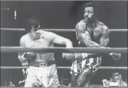  ?? Courtesy of United Artists/Zuma Press/TNS ?? Sylvester Stallone, left, as Rocky Balboa and Carl Weathers as Apollo Creed in “Rocky.”