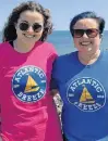  ??  ?? Atlantic Breeze brand manager Brittany Burke, left, and her mother, Roselyn Poirier Burke, model the company's T-shirts in this publicity photo.