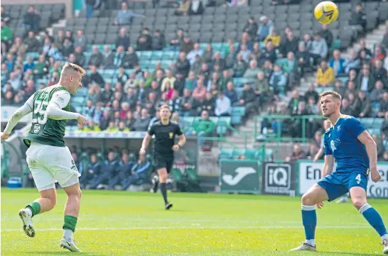  ?? ?? TO THE FORE: Striker James Scott heads home the Easter Road side’s fourth goal to complete his final day hat-trick.