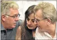  ?? Picture: EUGENE COETZEE ?? IN CONFERENCE: Former bank manager Phillip Vosloo, left, with Christophe­r Panayiotou’s parents, Fanoula and Costa