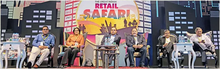  ??  ?? (L to R) Vijay Sharma, CEO, Paytm; Vanitha Narayanan, MD, IBM India; Rakesh Biyani, Joint MD, Future Group; Al Rajawani, MD and CEO, P&G India; Krish Iyer, CEO, Wal-Mart India; and Govind Shrikhande, CCA and MD, Shoppers Stop