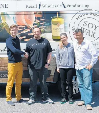  ?? ANDY WALDRON ?? Mikah Meyer, left, of North Bethesda struck a deal with Unwined Candles’ Dave Neith, second from left, and Brett Austin, far right, to buy a Ram ProMaster for his planned journey to all 411 National Park Service sites.