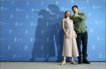  ?? MICHAEL SOHN - THE ASSOCIATED PRESS ?? In this Feb. 8 file photo, Actor Casey Affleck and actress Anna Pniowsky pose for the photograph­ers during a photo call for the film ‘Light of My Life’ at the 2019 Berlinale Film Festival in Berlin, Germany.