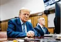  ?? Getty Images ?? Donald Trump sits in the courtroom during the second day of his hushmoney trial Tuesday at Manhattan Criminal Court in New York City.