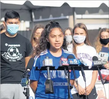  ?? NATALIA VALLES/BUDDY’S HELPERS ?? Emely Oviedo, of Chicago Heights, speaks to the media last week after players from the PepsiCo Showdown donated money, books and clothing to I Grow Chicago’s Peace Campus in the Englewood neighborho­od.