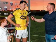  ?? SPORTSFILE ?? Brave face: Wexford’s Rory O’Connor accepts his man of the match award after his team’s Leinster Under 21 final loss to Galway on Wednesday