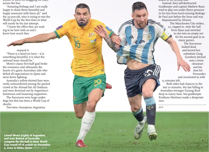  ?? Photo: VCG ?? Lionel Messi (right) of Argentina and Aziz Behich of Australia compete for the ball in their World Cup round-of-16 match on December 3, 2022 in Doha, Qatar.