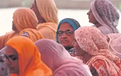  ?? AFP ?? Women take part in a demonstrat­ion against the central government’s agricultur­al reforms at the Haryana-Rajasthan border in Shahjahanp­ur yesterday.