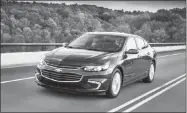  ?? GENERAL MOTORS ?? The 2018 Chevrolet Malibu Hybrid offers noise-reducing side windows, Apple Carplay and in-car Wi-fi.