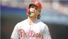  ?? SCOT TUCKER/AP ?? Bryce Harper reacts after a called third strike on Saturday. After a 2-5 road trip, the Phillies are falling further back in the chase for the second wild card in the National League.