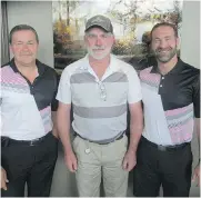  ??  ?? Pictured, from left, at the tournament are Shane Homes’ Dave Rickett, emcee Terry Grant aka “The Mantracker” and Shane Homes’ Shane Wenzel.