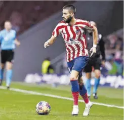  ?? //AFP ?? Carrasco sigue esperando que el Atlético le abra la puerta al Barça