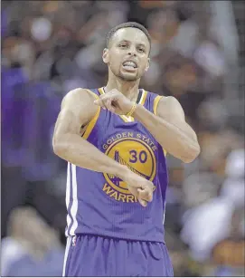  ?? PHOTOS BY TONY DEJAK / ASSOCIATED PRESS ?? Golden State’s Stephen Curry, who had 38 points, celebrates a basket against the Cavaliers during the second half of Game 4 of the NBA Finals in Cleveland on Friday. The Warriors won 108-97.