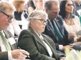  ?? ASSOCIATED PRESS FILE PHOTO ?? Michigan State University President Lou Anna Simon listens during a school function on Oct. 20. Simon submitted her resignatio­n Wednesday amid an outcry over the school’s handling of allegation­s against Larry Nassar.