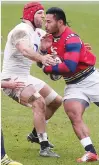  ??  ?? Benchmark: James Haskell tackles Manu Tuilagi in training