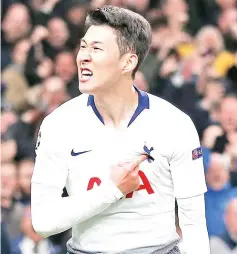  ?? - AFP photo ?? Tottenham Hotspur’s South Korean striker Son Heung-Min celebrates scoring the opening goal during the UEFA Champions League quarter-final first leg football match between Tottenham Hotspur and Manchester City at the Tottenham Hotspur Stadium in north London.