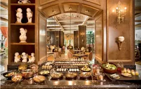  ??  ?? SXVIII, the all-day brasserie at the hotel. Below: The restaurant’s glass-walled Conservato­ry can accommodat­e up to 25 guests.