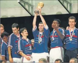  ?? ?? Zinedine Zidane with the trophy after France won the 1998 World Cup.